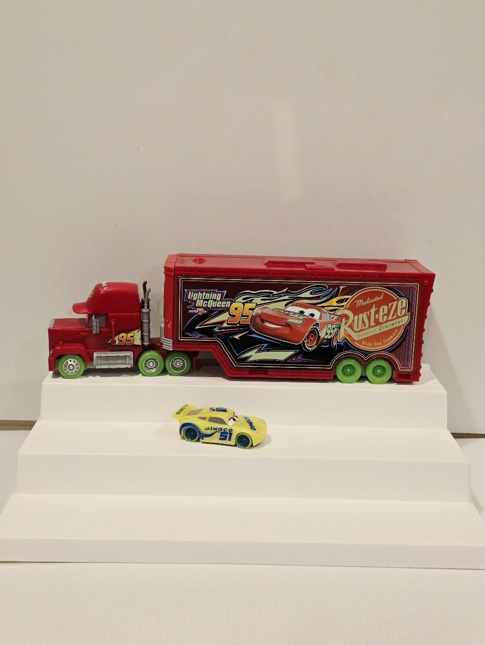 Disney Pixar Cars Glow Racers Mack Hauler Semi Truck Playset with Dinoco Cruz